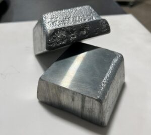 shows 2 square samples of Zinc