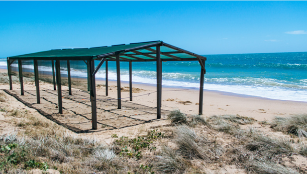 artificial shade being used on an Australian beach