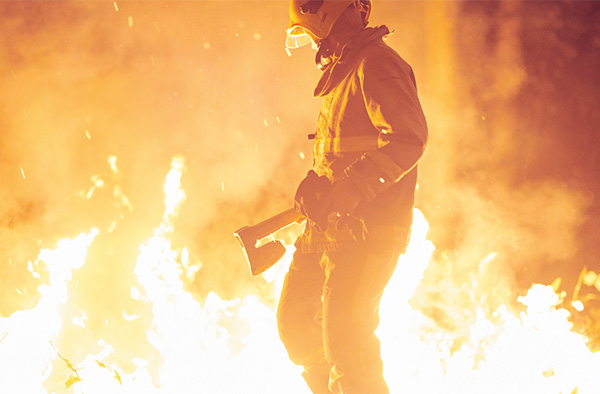 fire fighter with protective gear