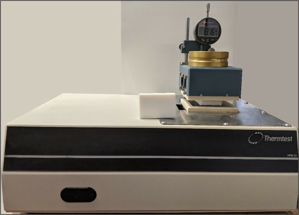 Airloy x103 sample outside and in between plates of the HFM-25